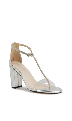 Sienna Silver Prom Shoes: Touch Ups 4275 in silver with a clear toe strap and a rhinestone-encrusted T-strap.