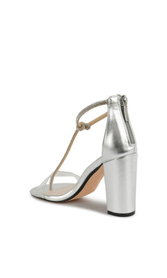 Sienna Silver Prom Shoes: Touch Ups 4275 in silver metallic featuring a clear front strap, a thin rhinestone-embellished T-strap, and a back zipper closure.