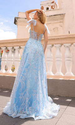 A woman in the Sequin Long Prom Ball Gown with Shoulder Bows T1336, a light blue A-line dress, stands outdoors with her back to the camera by a white railing near a pastel-colored building, touching her hair.