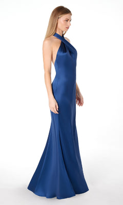 Woman in a floor-length, sleeveless Criss-Cross Halter Long Prom Dress (Astee T2005) stands in profile against a white background.