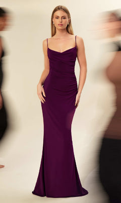 A woman in a fitted, floor-length wine Cowl Open-Back Long Prom Dress (Astee T2008) with spaghetti straps stands against a plain background as blurred figures pass by.