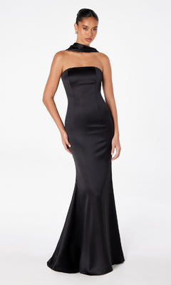 A woman in the Choker-Sash Strapless Long Prom Dress: Astee T2012 poses against a plain white background, showcasing its fitted satin design, flared hem, and matching neck scarf.