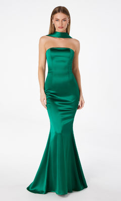 A woman stands against a plain white background in the Choker-Sash Strapless Long Prom Dress: Astee T2012, a sleeveless, floor-length green gown with a fitted bodice.