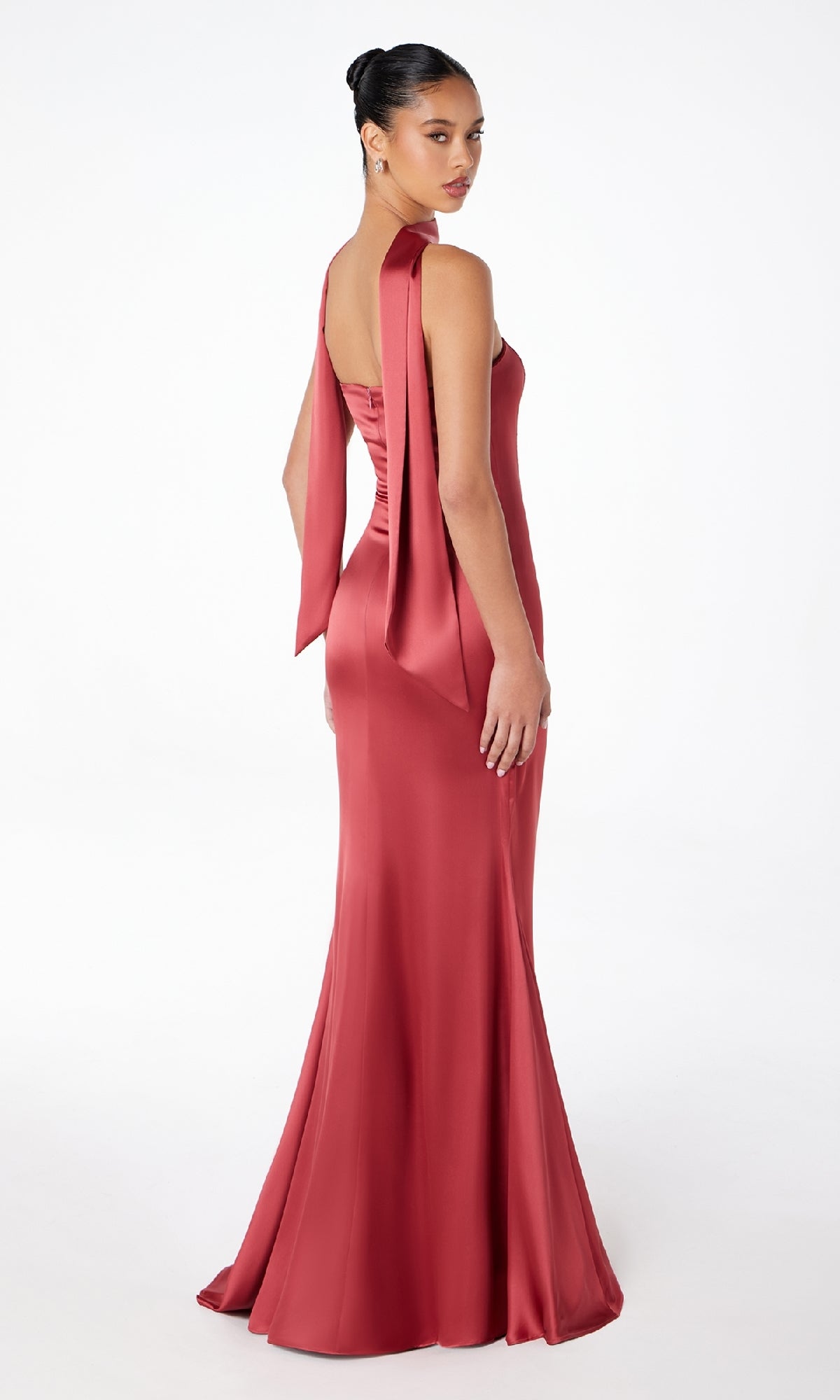 Woman wearing the Choker-Sash Strapless Long Prom Dress: Astee T2012, a floor-length rose pink satin gown with elegant bow detail, posing against a white background.