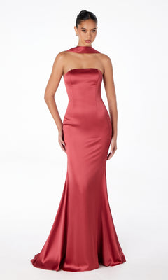 A woman wears the Astee T2012 Choker-Sash Strapless Long Prom Dress, a fitted, floor-length satin gown in reddish-pink with a matching neck scarf. The background is plain white.