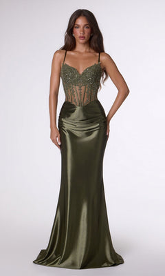 A woman wears the Lace-Up Long Corset Prom Dress: Amoris T819 in olive, featuring a beaded sheer corset bodice and satin skirt, standing against a plain light background.