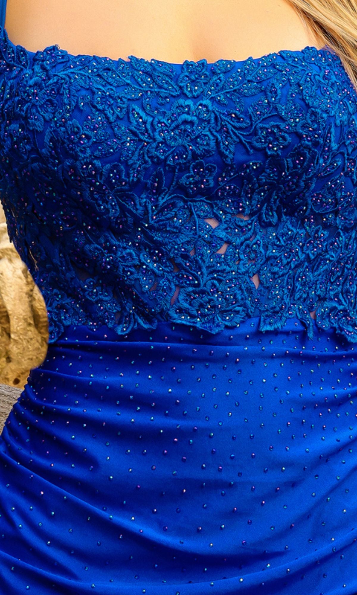 A close-up of the Embroidered-Bodice Short Homecoming Dress TM1013S, showcasing its intricately embroidered bodice.