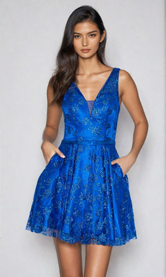 A woman faces forward in the Floral-Glitter V-Neck Short Homecoming Dress 9202, royal color, featuring a sleeveless design, floral patterns, pockets, and a v-neckline against a plain light background.