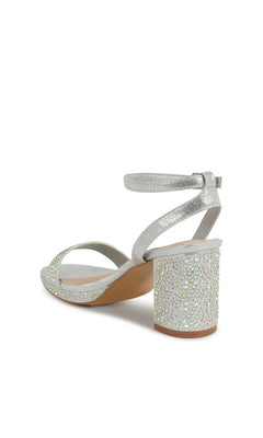 Topaz Silver Platform Prom Shoes: Touch Ups 4736 are silver metallic block heel sandals featuring an ankle strap and an iridescent rhinestone-encrusted heel.