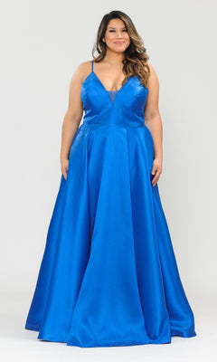 A woman poses against a plain background in the Plus-Size Long Corset Prom Dress with Pockets W1070, a sleeveless, floor-length bright blue gown featuring a V-neckline and thin straps.
