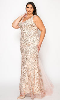 A woman wears the Plus-Size Long Glitter Mermaid Prom Dress W1136, a sleeveless, floor-length light pink gown with silver floral embroidery, standing against a plain white background.