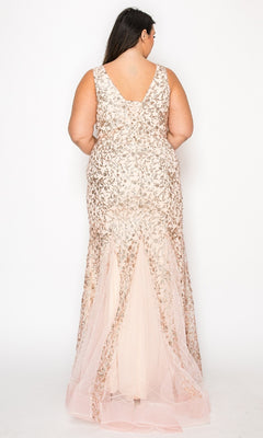 A woman in the Plus-Size Long Glitter Mermaid Prom Dress W1136 stands facing away from the camera, showing off its sleeveless, floor-length design and sparkling sequin details against a plain white background.