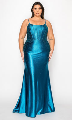 A woman models the Plus-Size Tight Beaded Prom Dress: PolyUSA W1164 in teal satin, featuring thin straps and intricate beading, standing against a plain white background.