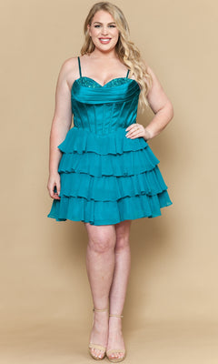 A woman stands against a beige background wearing the Poly USA W1196 Short Plus Size Homecoming Dress, featuring teal tiered ruffles, a satin corset bodice, spaghetti straps, and nude heels.