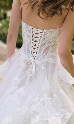 A close-up of the back of the Long White Wedding Dress: Andrea and Leo WL059, featuring strapless design, lace-up detailing, and delicate floral lace embroidery—ideal for a romantic bridal look.