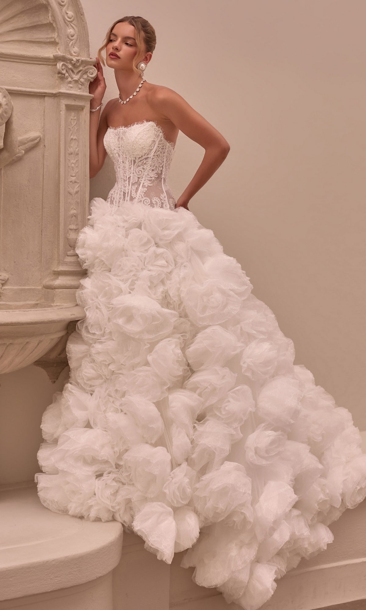 Andrea & Leo WL092 strapless ball gown featuring a corset bodice and a full, 3D rosette skirt covered in layered, ruffled fabric.