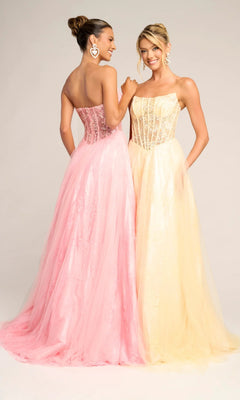 Two women stand side by side against a plain background, smiling in Portia and Scarlett XO023 long formal dresses—one wears pink. Each strapless gown features a lace corset bodice with tulle and elegant lace details.