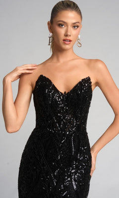 A woman models the Portia and Scarlett XO134 long formal dress, featuring a strapless sweetheart neckline with sparkling embellishments, styled with large drop earrings against a plain light background.