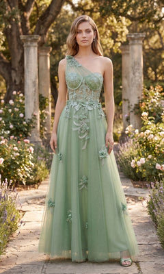 A woman in the sage Long Prom Dress: Chicas YG5028, featuring a one-shoulder design with floral embellishments and an elegant A-line glitter tulle chiffon skirt, stands on a garden path surrounded by flowers and stone columns, adding a sparkling touch to the enchanting scene.