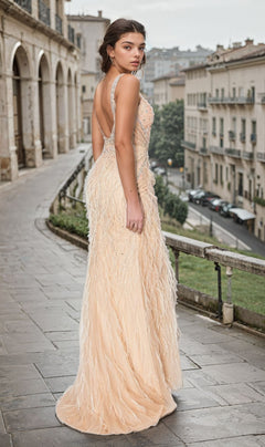 A woman in the Long Champagne Feather Prom Dress (Chicas YG5036) stands on a city sidewalk, glancing over her shoulder as buildings and parked cars line the background.