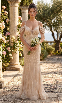 A woman wearing the Long Prom Dress: Chicas YG5042 in champagne, adorned with elegant pearl embellishments and featuring an off-the-shoulder design, holds a bouquet of white flowers while standing on a stone path amid lush greenery and blooming roses.