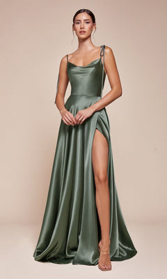 A woman in the Cowl-Neck Long Satin Prom Dress: Ladivine BD104—a moss green, floor-length gown with spaghetti straps and a thigh-high slit—stands against a plain beige background.