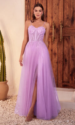 A woman stands before wooden doors wearing the Sheer-Waist Long Glitter-Tulle Prom Dress C150 in lavender with spaghetti straps, lace bodice, and thigh-high slit. A cactus and large pot can be seen nearby.