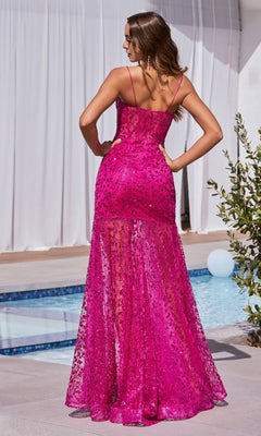 A woman stands poolside with her back to the camera, wearing the Sheer-Waist Long Glitter-Print Prom Dress C155 in bright pink sequins, featuring thin straps and a sheer corset waist.