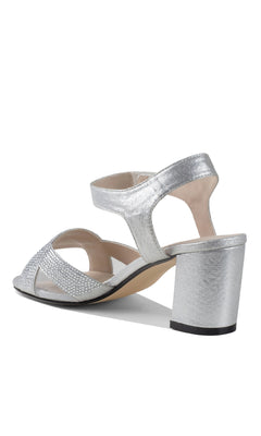 The Cam Silver Shimmer Prom Dress Shoes: Touch Ups 4638 are stylish silver shoes with an open-toe design, mid-height block heels, ankle strap, and sparkling rhinestone embellishments on the front strap.