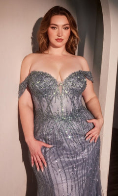 A woman poses with her hands on her hips against a light wall, wearing the Plus-size Blue Beaded Prom Gown: Ladivine CC341C.