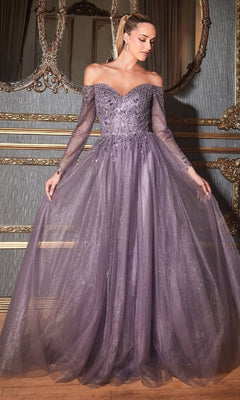 A woman wearing the Ladivine CD0172, a long sleeve off-the-shoulder prom dress with a tulle skirt and floral embellishments, stands in an ornate, classic room.