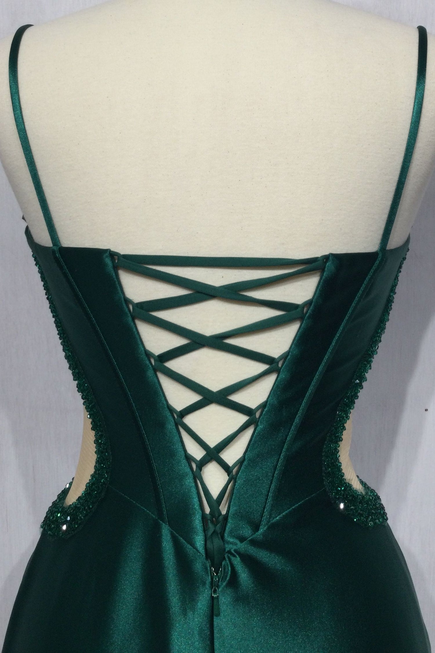 Back view of the Sheer-Side Strapless Long Prom Dress CD273 in dark green satin, featuring lace-up corset detail and beaded embellishments—an affordable formal gown ideal for your next special event.