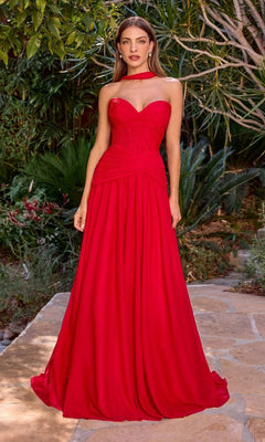 A woman stands on a stone path amid lush greenery, wearing the Ladivine CD395 long prom dress featuring a strapless sweetheart neckline and an elegant a-line skirt.