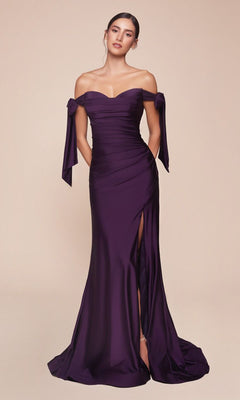 A woman models the Off-Shoulder Ruched Prom Dress: Ladivine CD943 in deep purple stretch jersey, featuring a side slit and sleeve bows, set against a plain beige background.