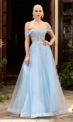 A woman in the Sheer-Bodice Long Glitter Prom Ball Gown CD961 stands in front of open wooden doors.