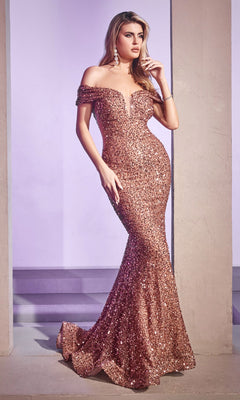 A woman models the CD975 Off-the-Shoulder Long Sequin Prom Dress in rose gold, standing between two indoor columns.