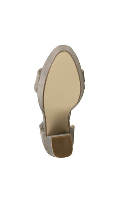 Close-up view of the sole of the Chloe Champagne Shimmer Prom Shoes: Touch Ups 4648, highlighting the treadless bottom and block heel against a white background.
