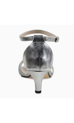 Back view of Clementine Silver Glitter Prom Shoes (Touch Ups 4613) featuring an ankle strap and moderate kitten heel, displayed against a white background.