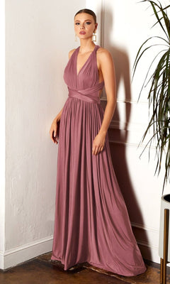 A woman stands indoors against a white wall, wearing the Amoris CV01 Multi-Wrap Long A-Line Prom Dress—an affordable sleeveless mauve gown featuring a gathered waist and deep V neckline.
