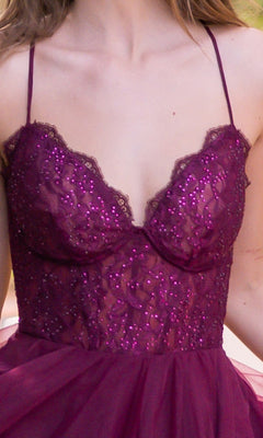 A close-up of a woman's upper torso wearing the Velvi Long Sweetheart A-Line Prom Dress Dani, a sleeveless deep purple gown with lace, sequins, and thin straps.