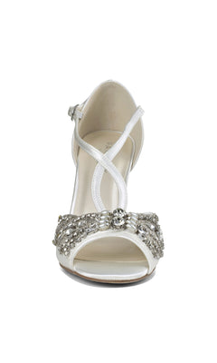The Elin Ivory Satin Prom Shoes by Paradox London (P2204) showcase a stiletto heel, ankle strap, and silver rhinestone-embellished toe strap for an elegant jeweled look.