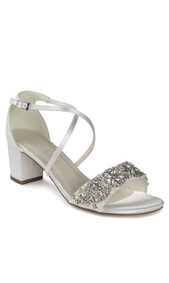The Evangeline Ivory Satin Prom Shoes by Paradox London (P2200) feature low block heels, ankle straps, and silver bead and crystal embellishments—an elegant choice for jeweled formal footwear.