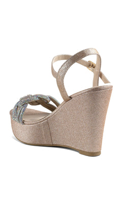 The Gemini Champagne Glitter Prom Shoes (Touch Ups 4650) feature sparkling glitter, jeweled straps, a wedge heel, and multicolored beaded front accents—perfect for a glamorous look.