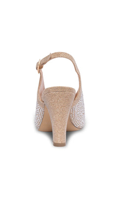 Rear view of Glory Champagne Prom Shoes: Paradox London P2301, featuring an ankle strap, high heel buckle, open toe design, and a textured glittery champagne finish on a white background.
