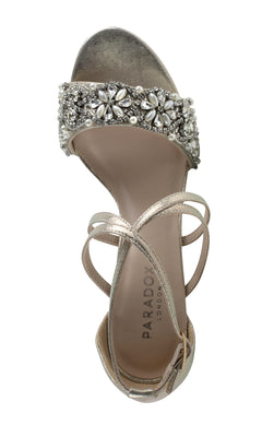 A top view of Hira Champagne Prom Shoes by Paradox London (P2102) shows metallic sandals with crystal accents on the front strap and crisscross ankle straps, perfect for adding sparkle to your prom look.