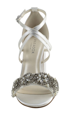 Front view of Hira Ivory Satin Prom Shoes: Paradox London P2103 featuring a low heel, crisscross ankle straps, and a pearl and rhinestone-embellished toe strap.