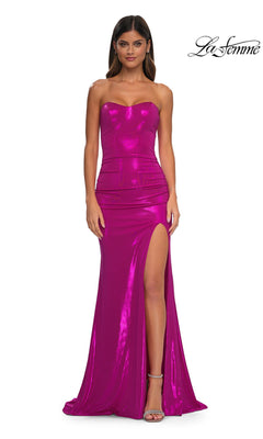 A woman faces forward in the fitted La Femme 32757, a strapless metallic fuchsia prom dress with a sweetheart neckline and high slit. The shimmery, floor-length gown features the La Femme logo in the top right corner.