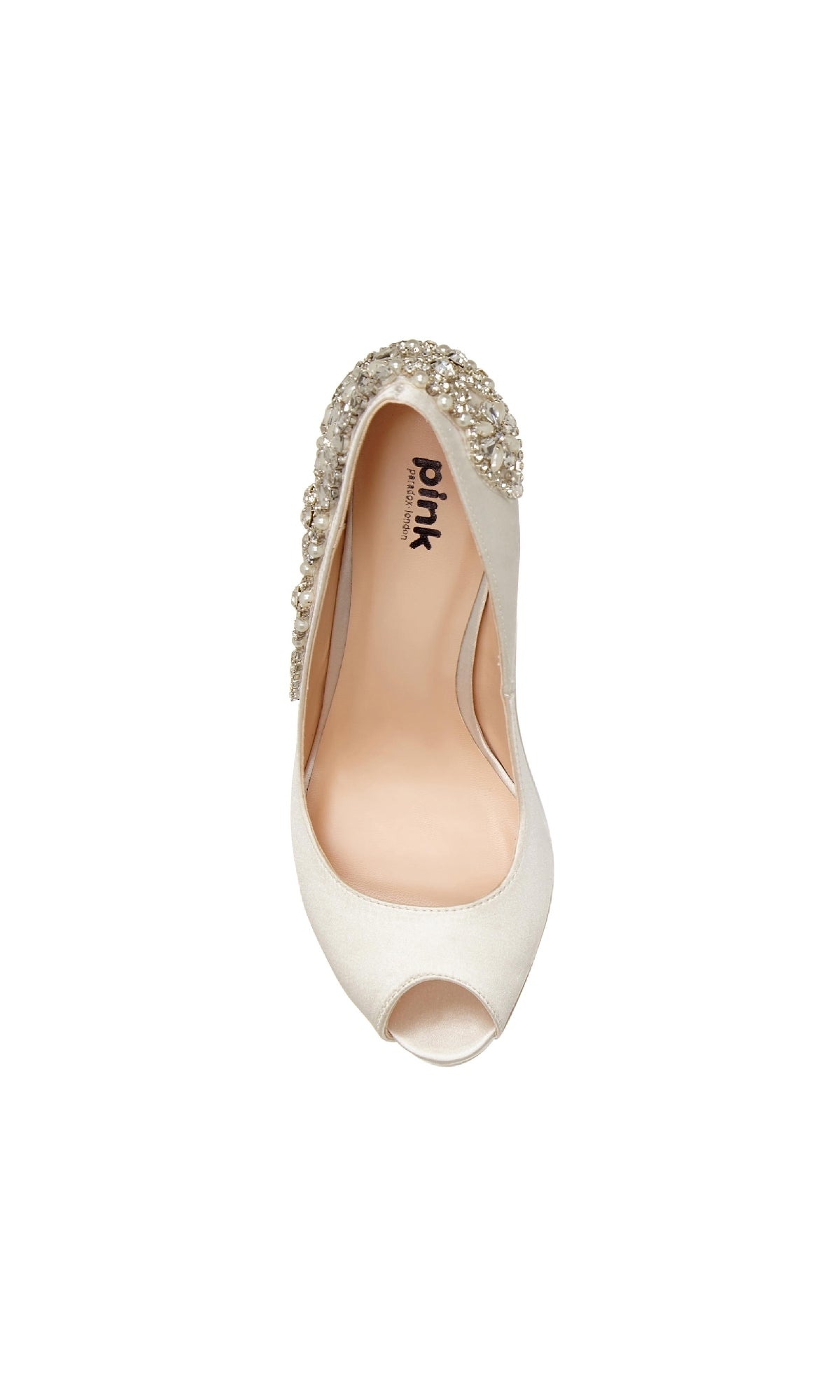 The Indulgence Ivory Satin Prom Shoes (Paradox London P1710) are white satin peep-toe stilettos with jeweled heel embellishments, shown in a top-down view.