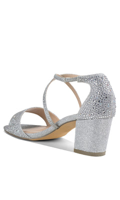 The Ines Silver Prom Shoes by Paradox London (P2211) are block-heeled sandals with open toe, ankle strap, and rhinestone details on the heel and straps—ideal for adding glamorous elegance to your prom look.