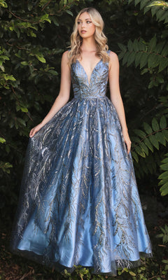 A woman wearing the Sleeveless Glitter-Print Long Prom Dress J812 stands outdoors in front of dense leafy greenery.